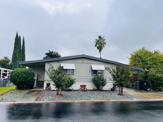 a view of a house with a street
