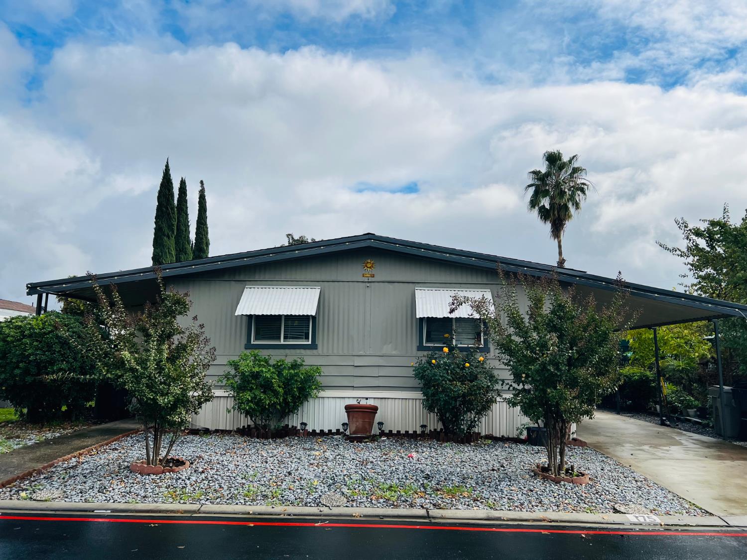 3950 Mack Road, Unit 175 Sacramento, CA 95823 - Photo 19 of 19 a house view with a garden