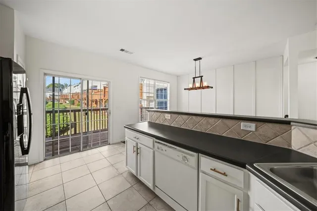 a view of livingroom with hardwood floor and a ceiling fan