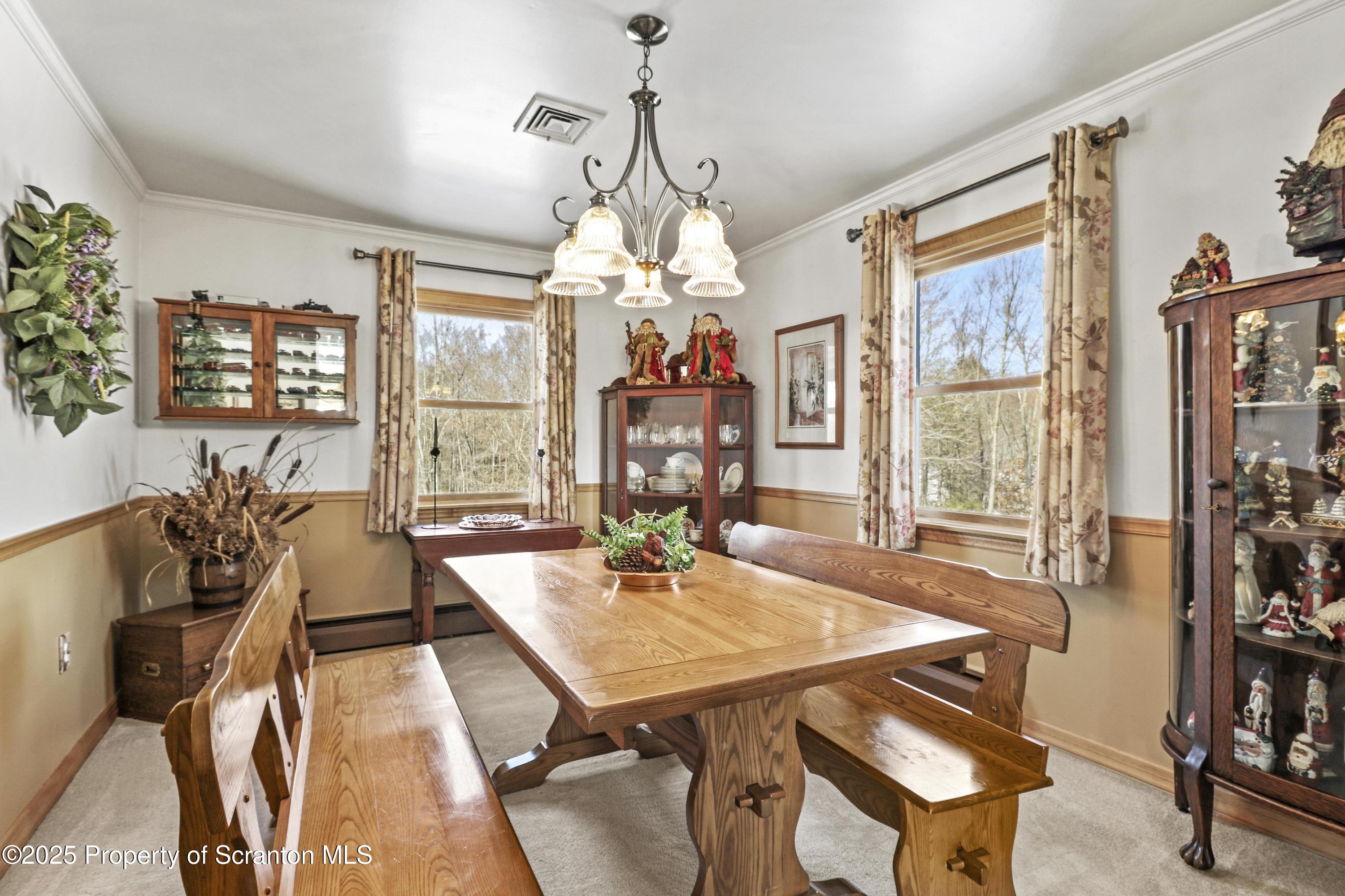 337 Ross Road Dalton, PA 18414 - Photo 11 of 45 a view of a dining room with furniture window and outside view
