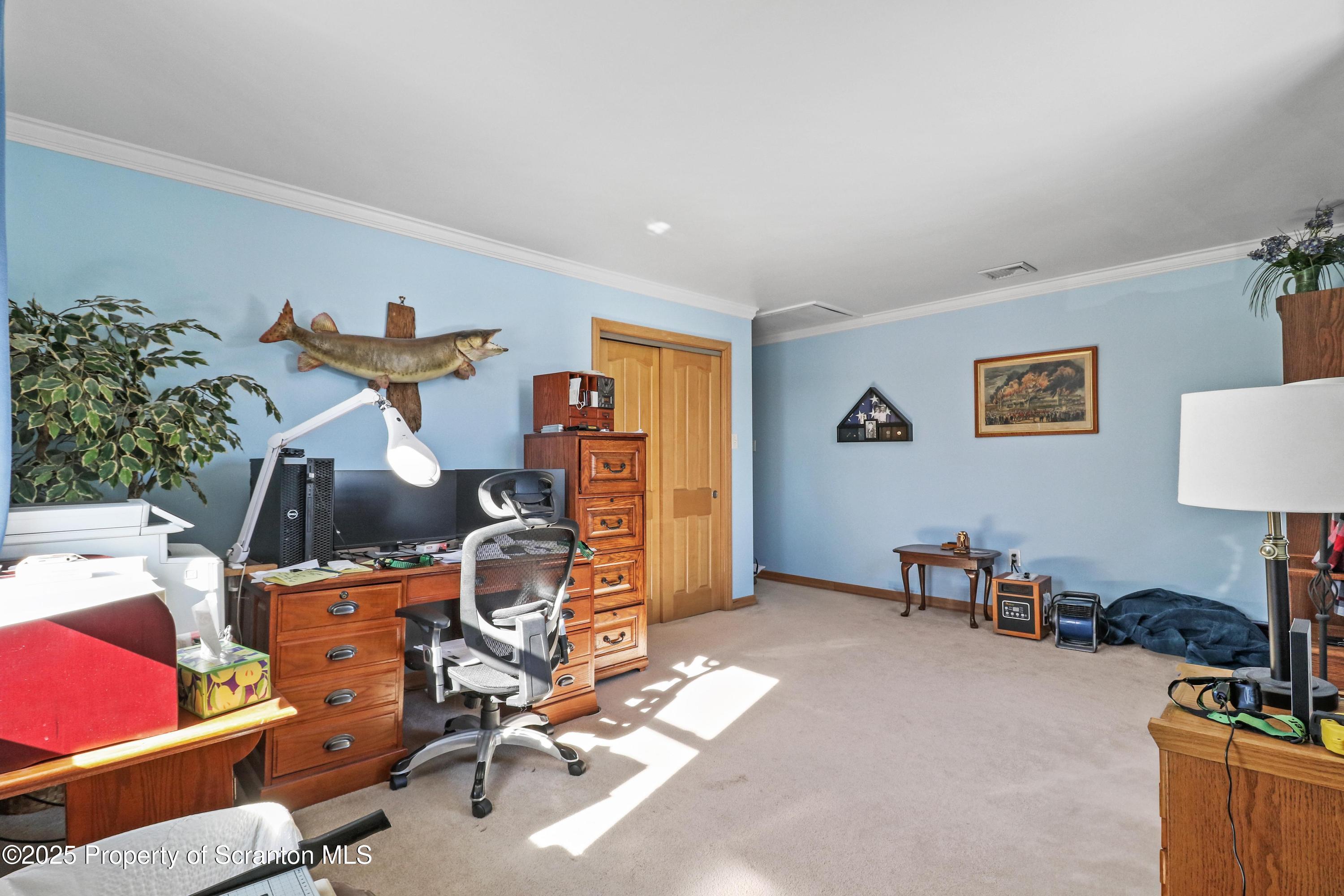 337 Ross Road Dalton, PA 18414 - Photo 21 of 45 a view of a room with gym equipment