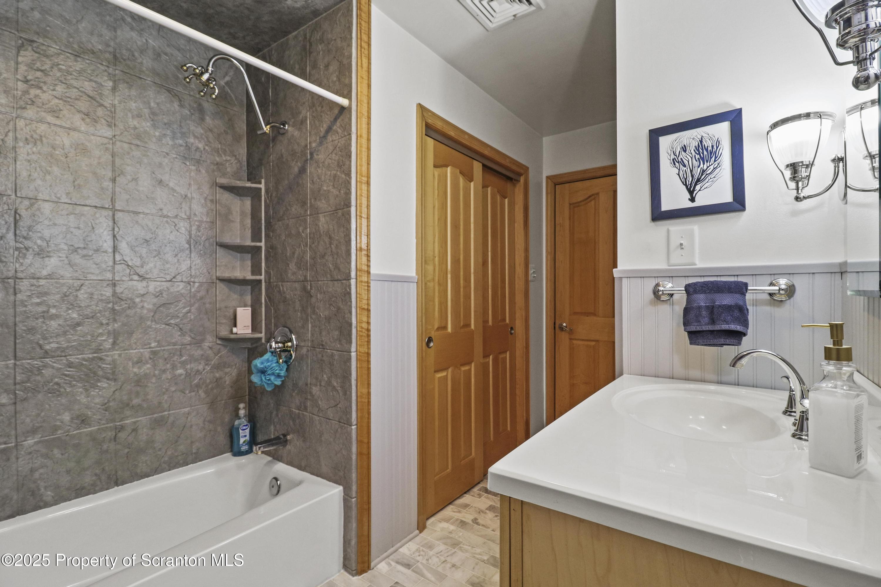337 Ross Road Dalton, PA 18414 - Photo 24 of 45 a bathroom with a sink and a bathtub