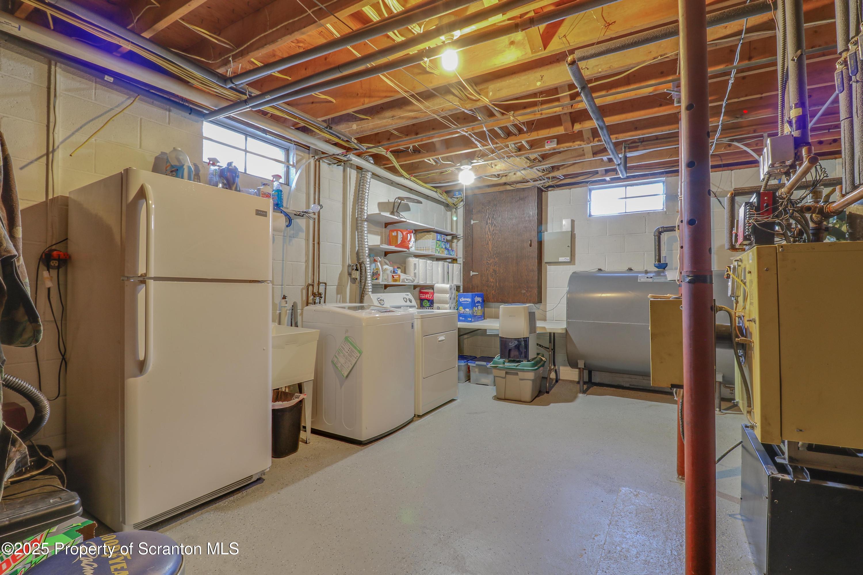 337 Ross Road Dalton, PA 18414 - Photo 27 of 45 a utility room with dryer and washer