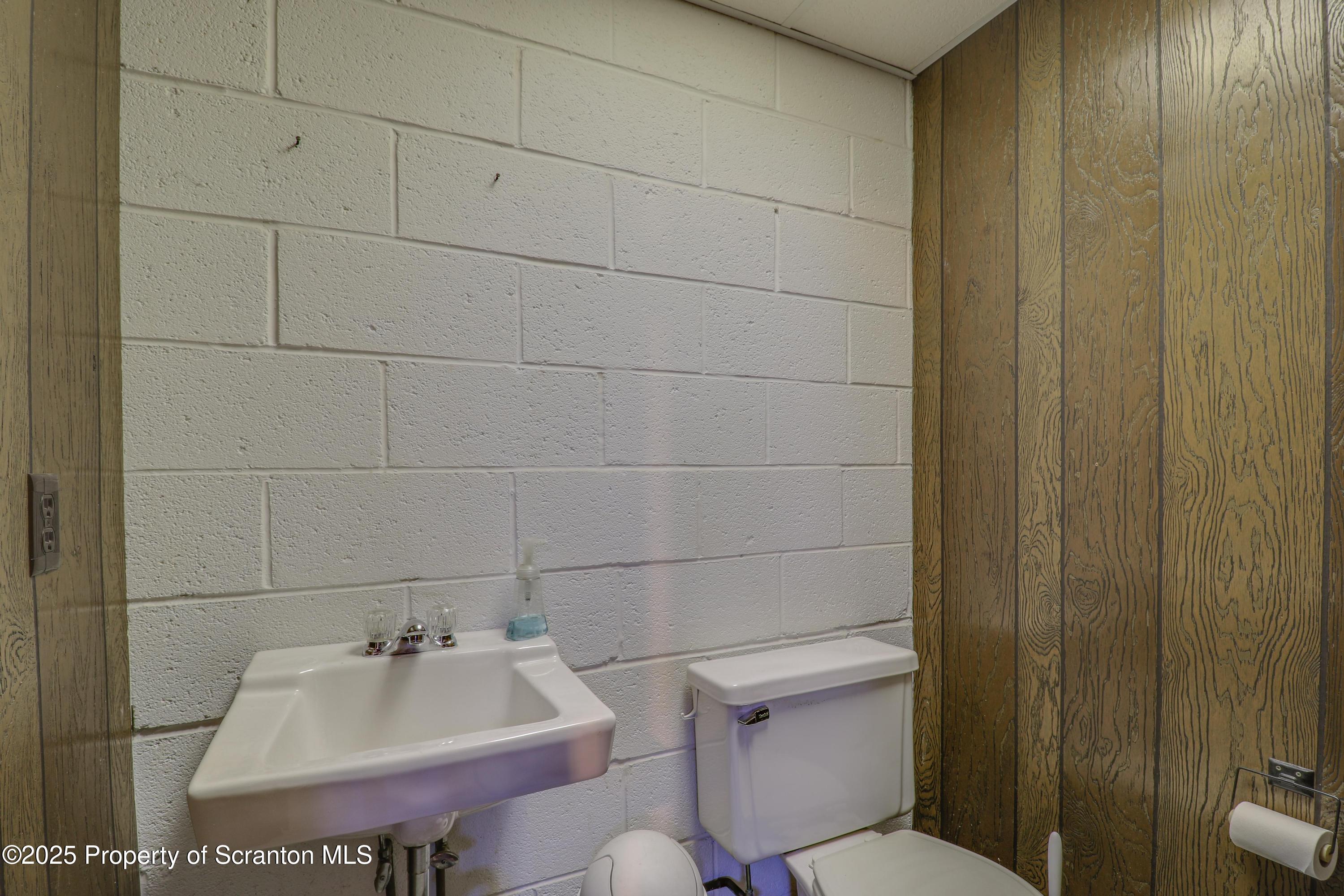 337 Ross Road Dalton, PA 18414 - Photo 28 of 45 a bathroom with a sink toilet and shower