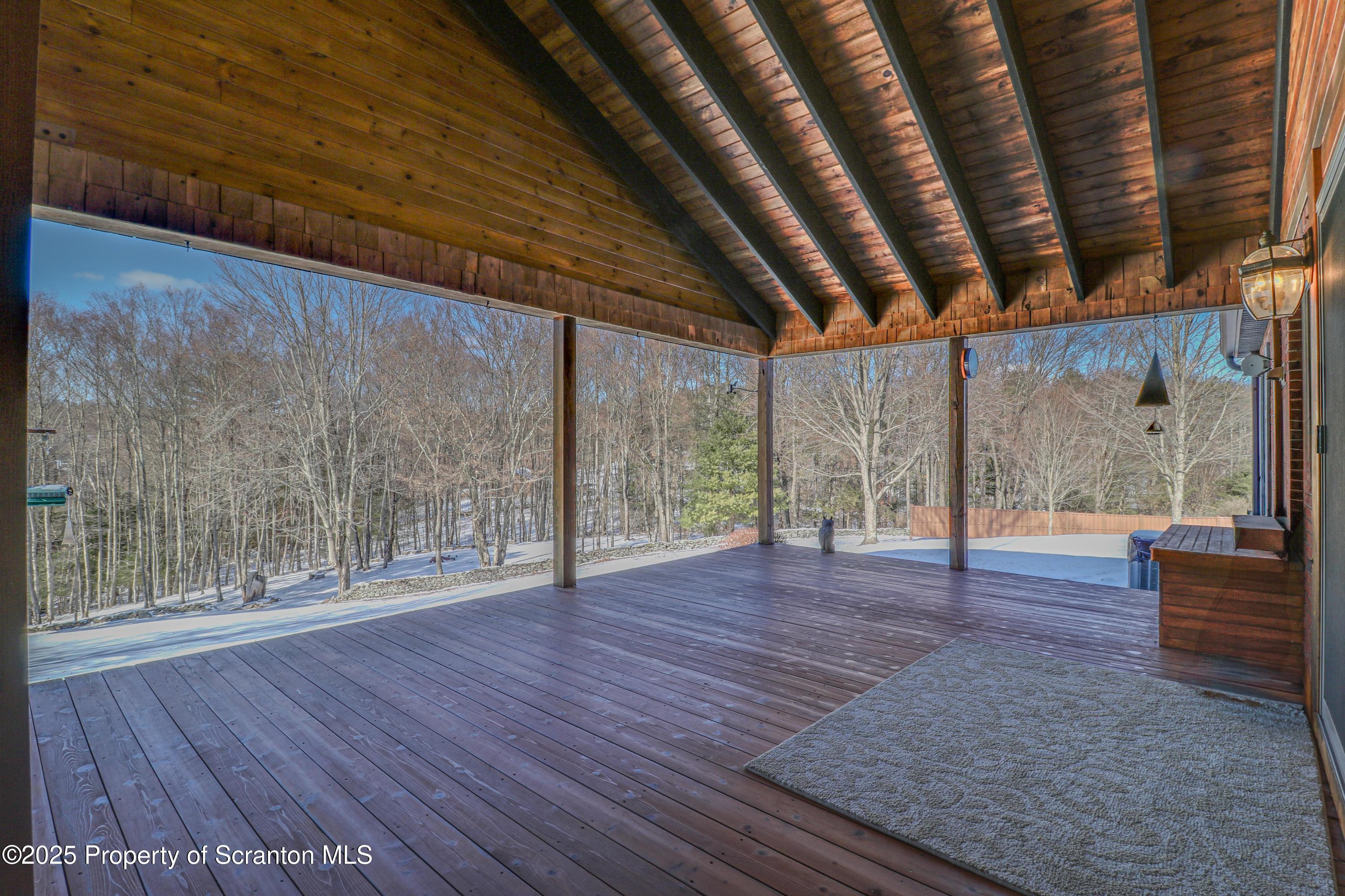 337 Ross Road Dalton, PA 18414 - Photo 35 of 45 a view of room with wooden floor and fence