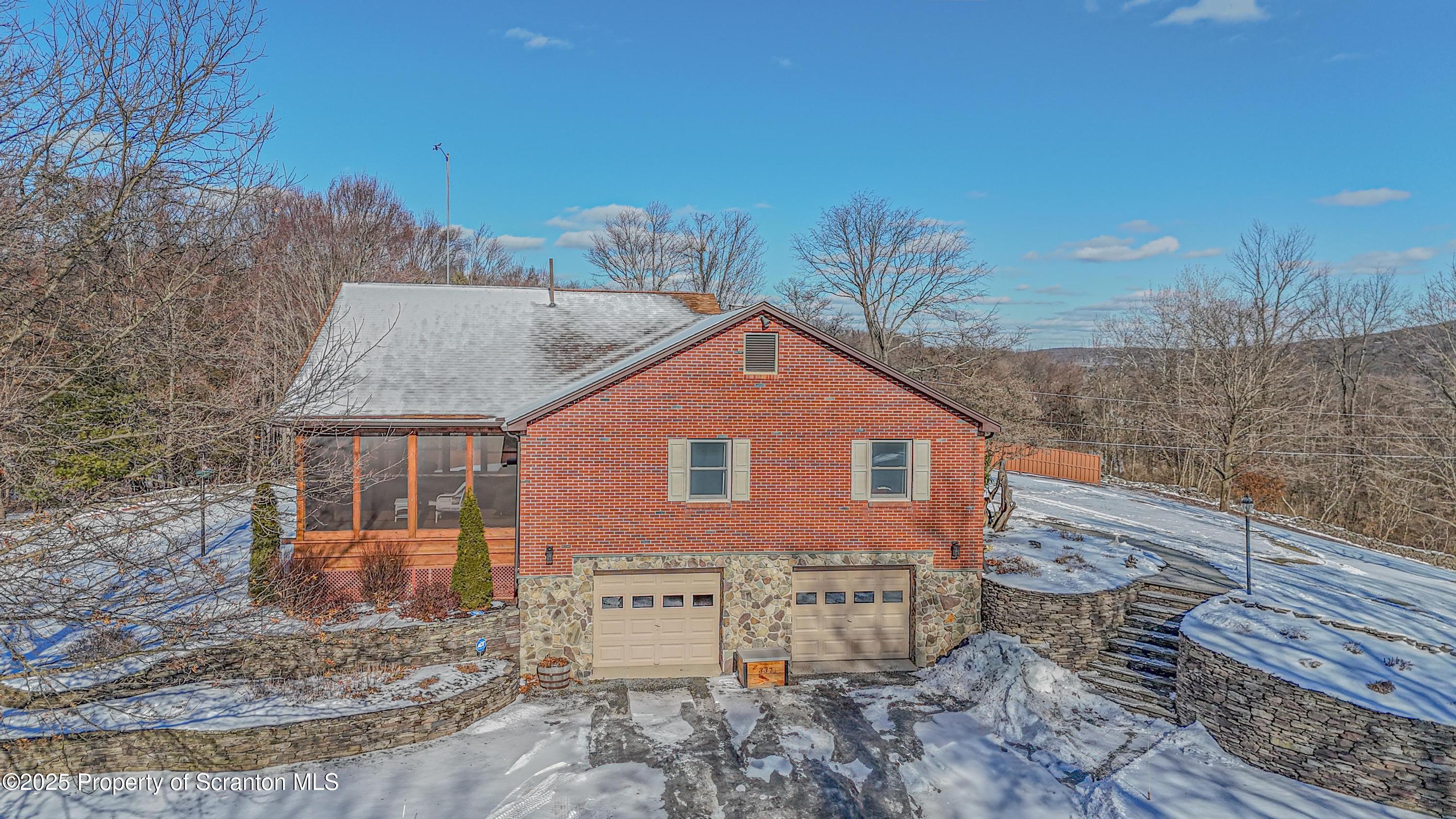 337 Ross Road Dalton, PA 18414 - Photo 38 of 45 a view of a house with a yard