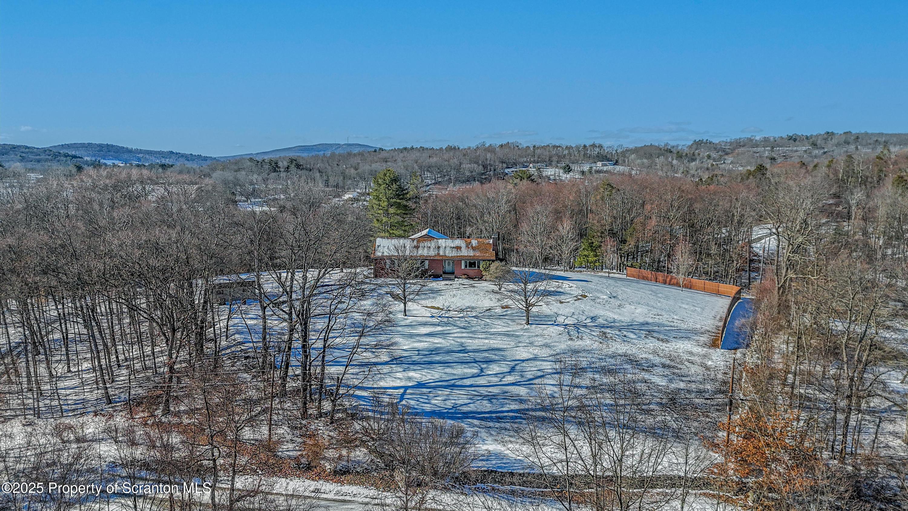 337 Ross Road Dalton, PA 18414 - Photo 40 of 45 a view of a terrace with a yard