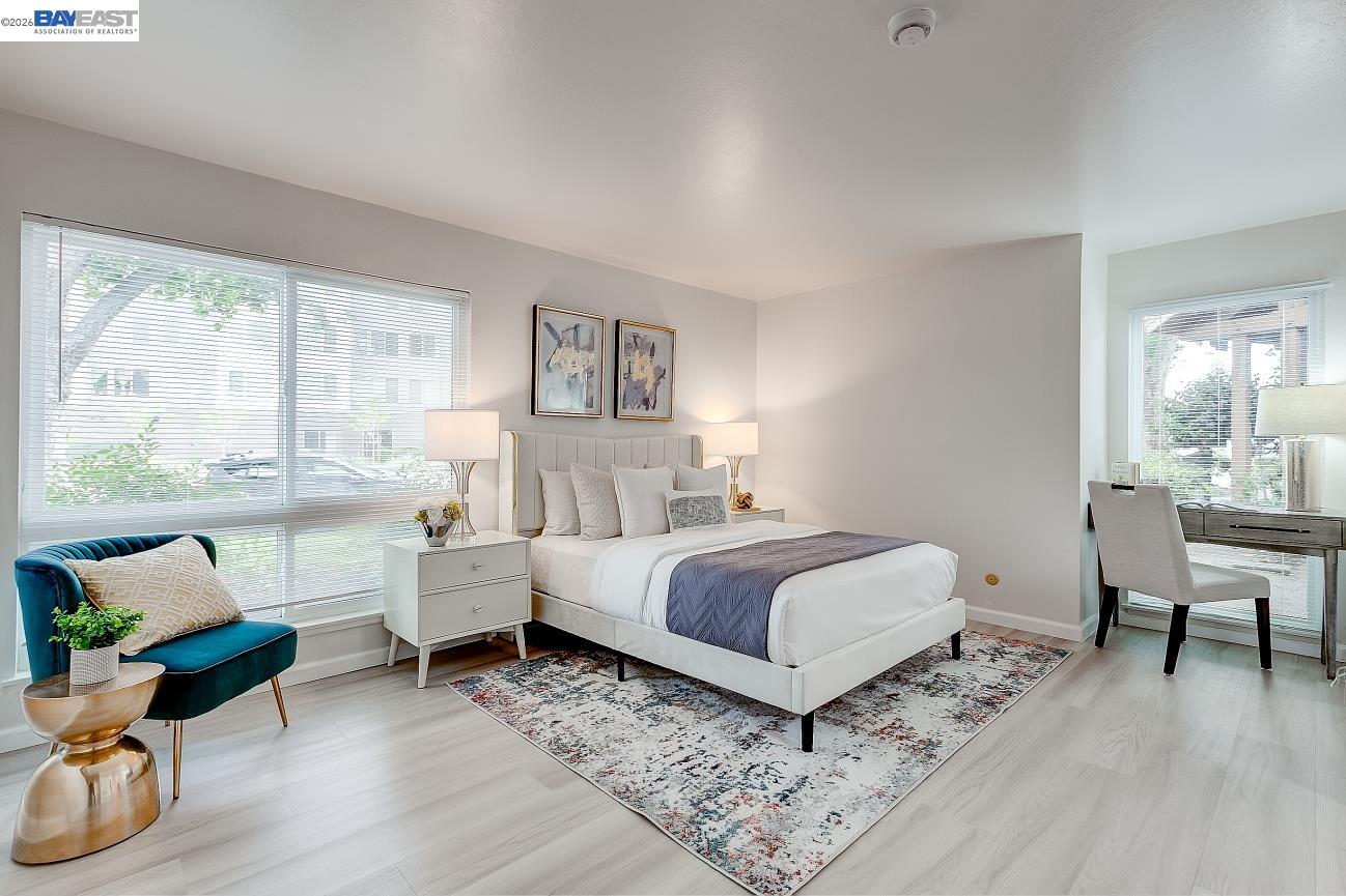 9005 Alcosta Boulevard, Unit 199 San Ramon, CA 94583 - Photo 39 of 57 a bed room with a bed and a chair