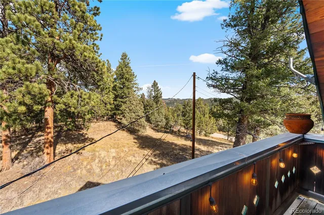 a view of a street from a balcony
