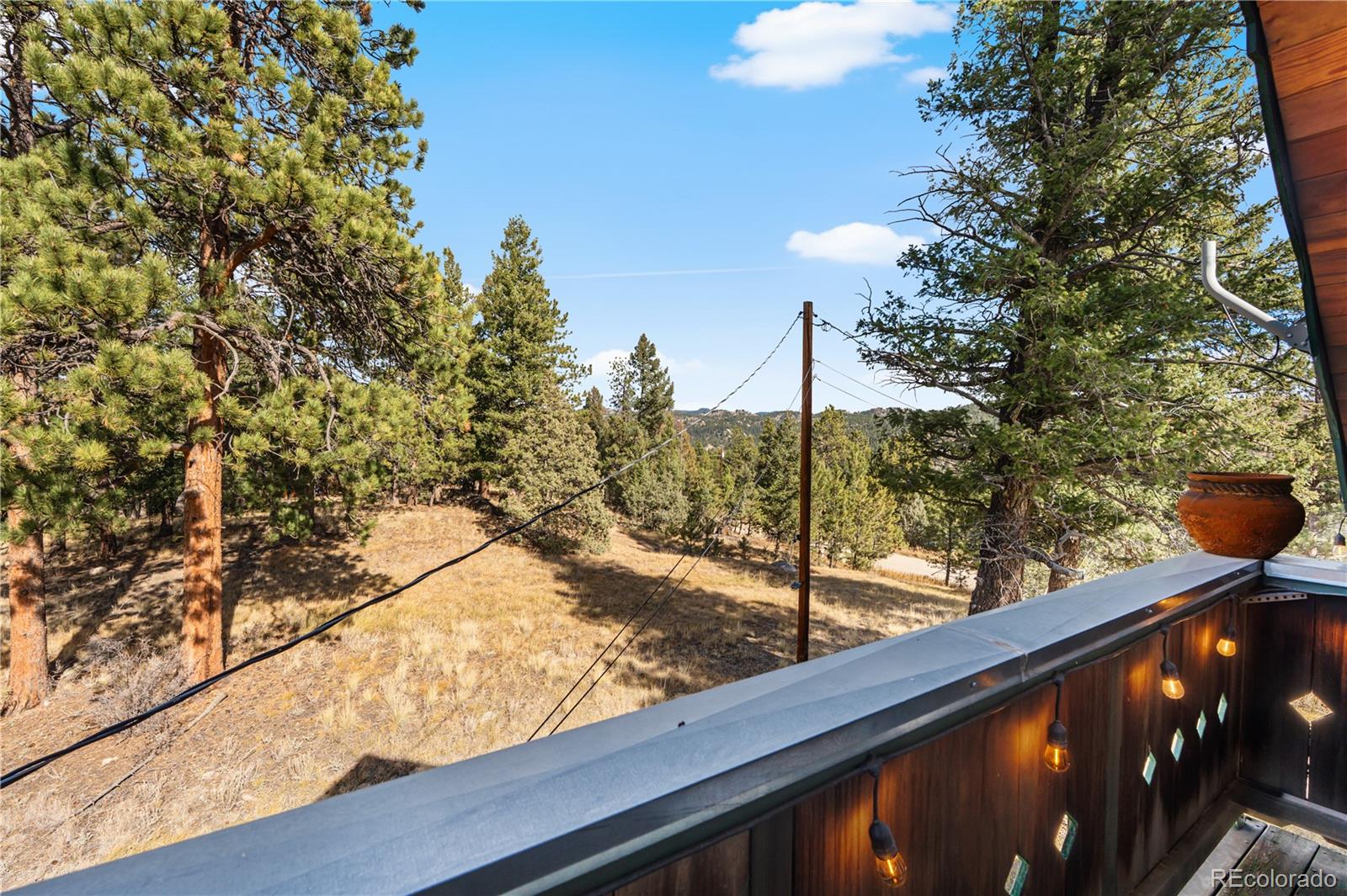 243 Hi Meadow Drive Bailey, CO 80421 - Photo 26 of 37 a view of a street from a balcony