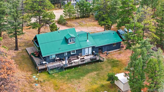 a view of a town with mountains in the background