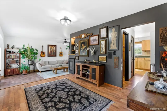 a living room with furniture and a rug
