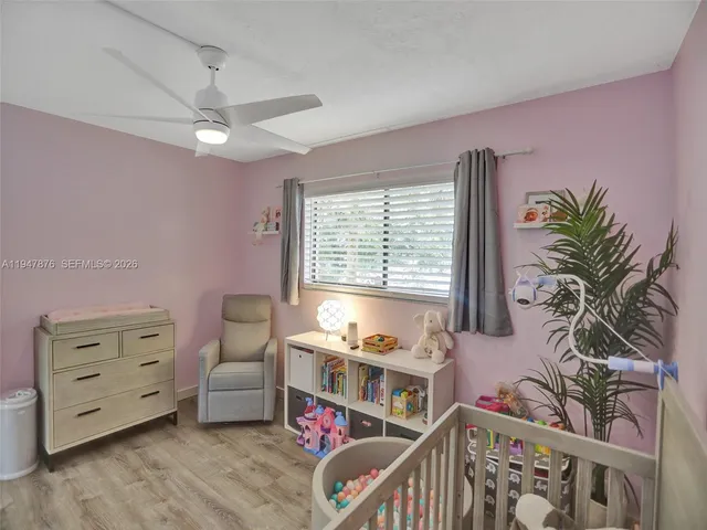 a livingroom with furniture and a flat screen tv