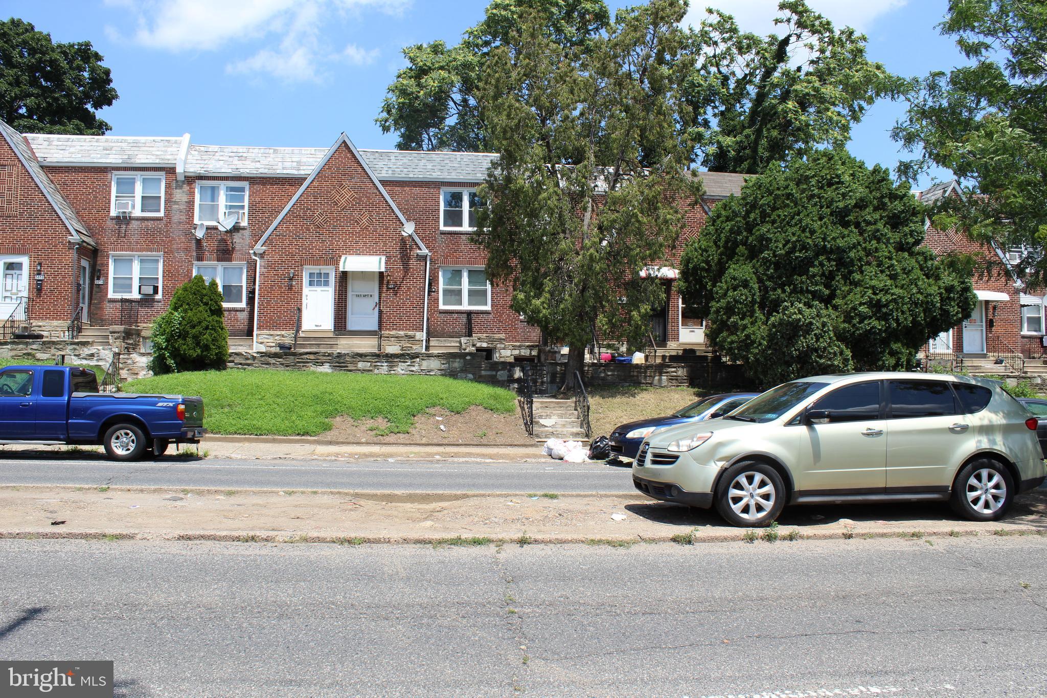 565 East Tabor Road Philadelphia, PA 19120 - Photo 1 of 20 a view of a car parked on the side of a street