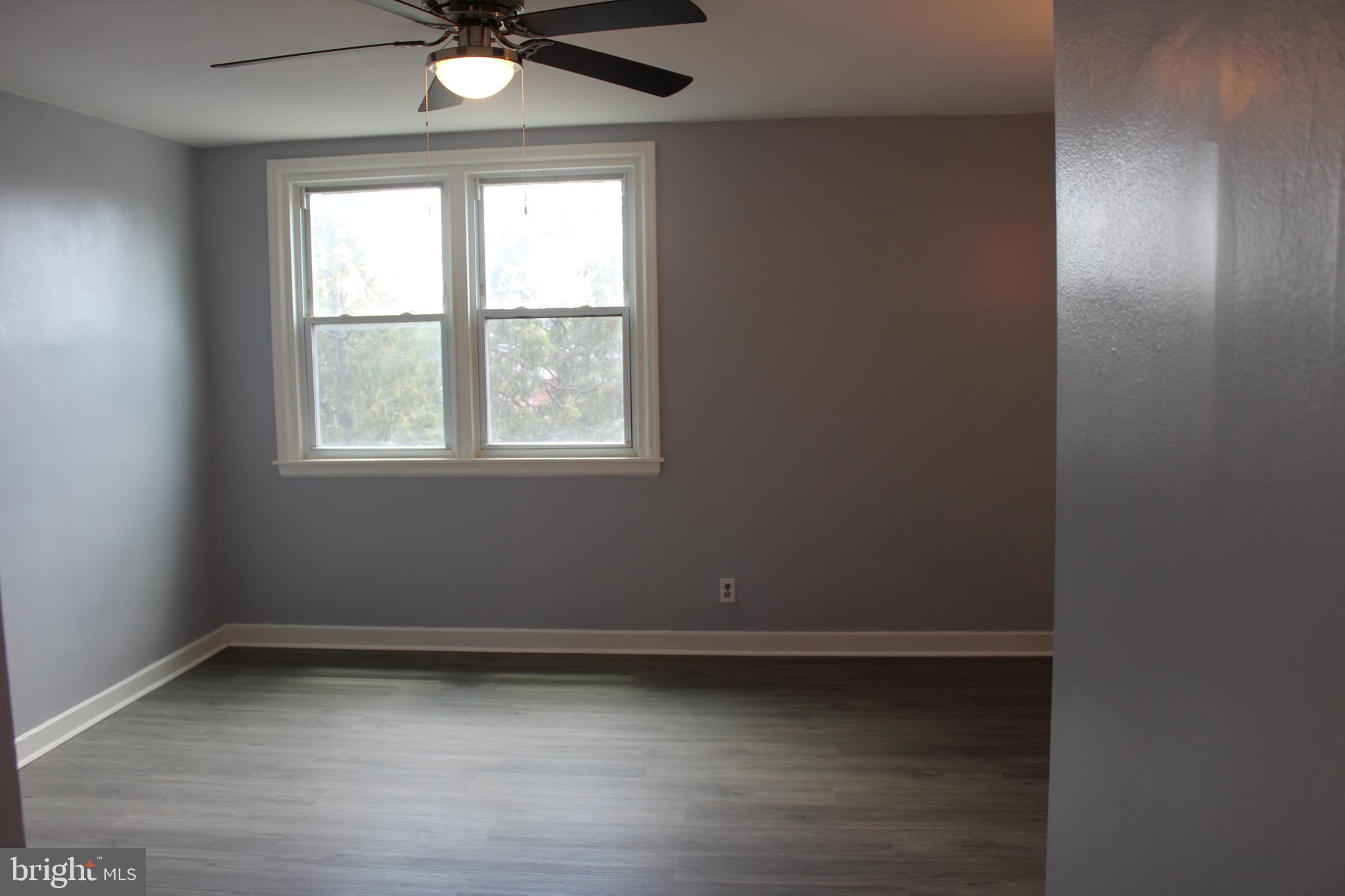 565 East Tabor Road Philadelphia, PA 19120 - Photo 11 of 20 an empty room with a window