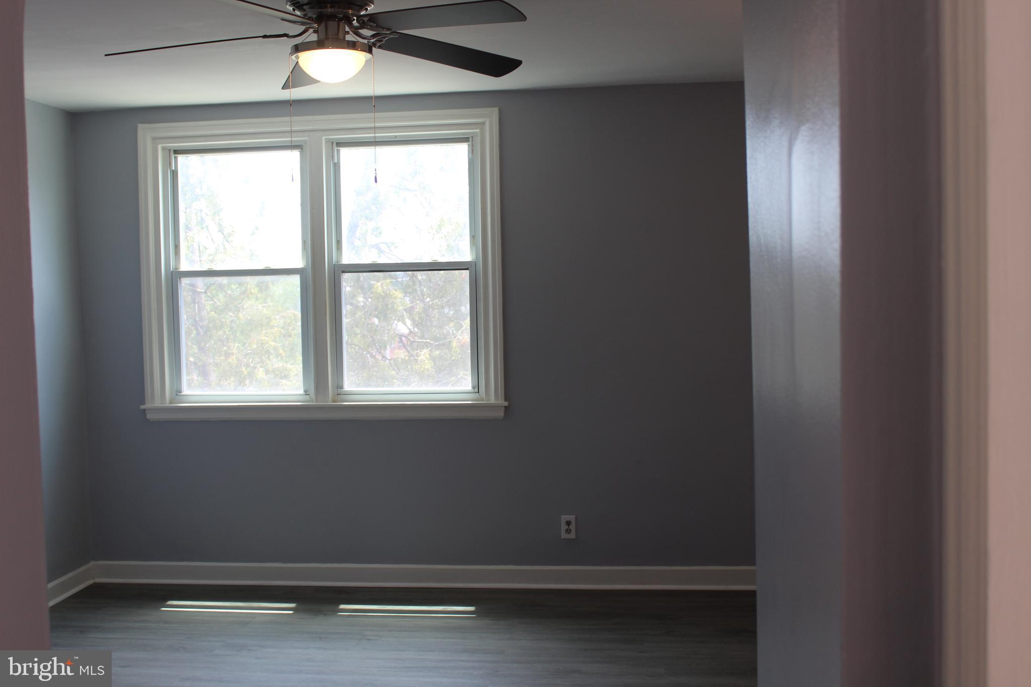 565 East Tabor Road Philadelphia, PA 19120 - Photo 13 of 20 an empty room with a window