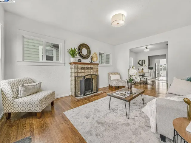 a kitchen with stainless steel appliances a refrigerator and a stove top oven