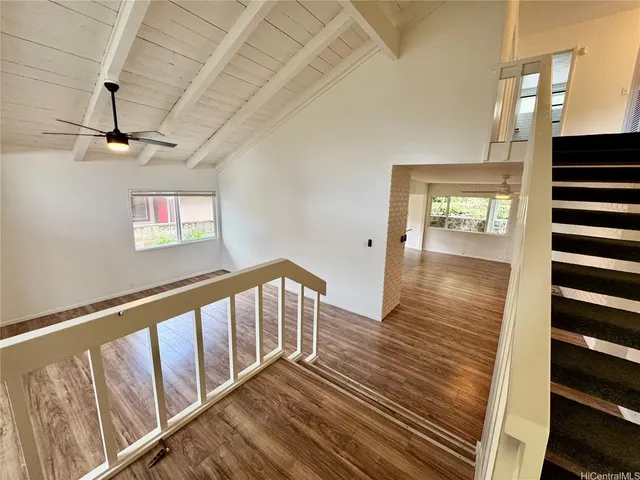a view of entryway with wooden floor