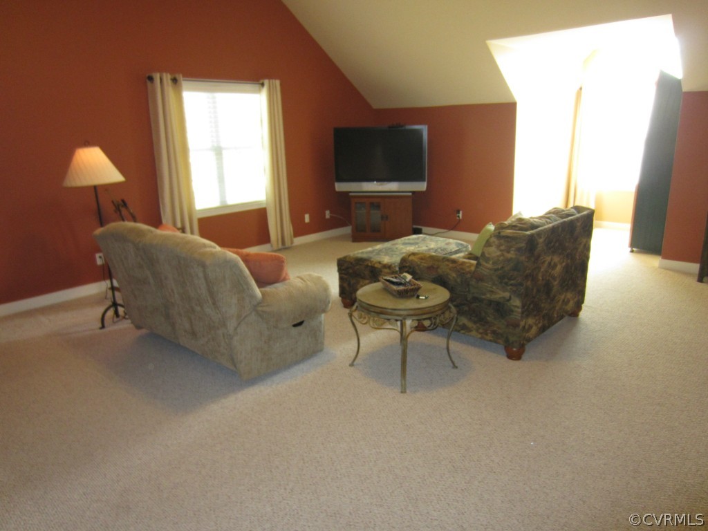 13312 Carters Valley Road Chesterfield, VA 23838 - Photo 16 of 24 a living room with furniture and a flat screen tv