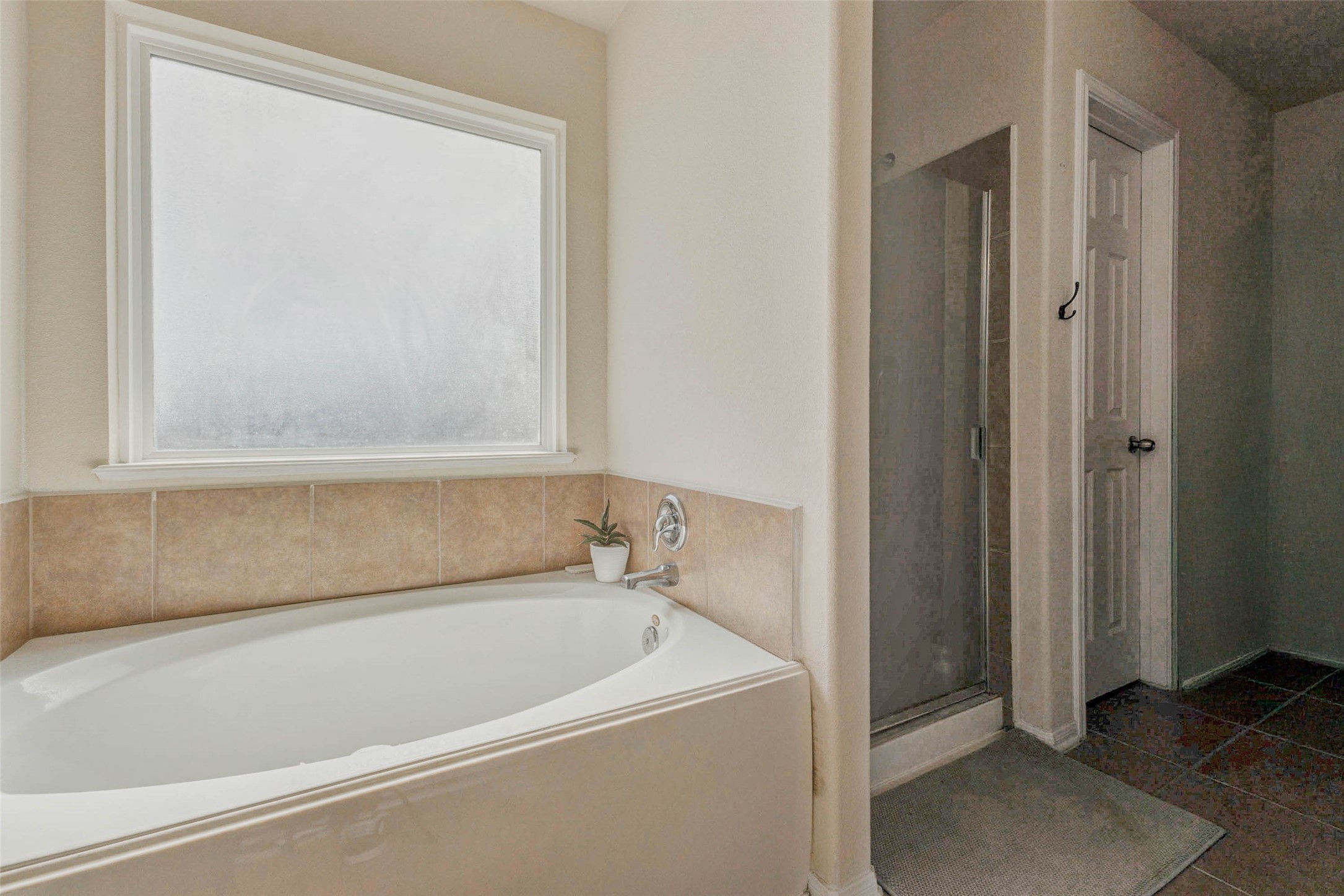 3027 Upland Spring Trace Katy, TX 77493 - Photo 19 of 29 a bathroom with a bathtub and a shower