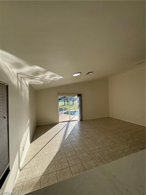 21565 Windham Run Estero, FL 33928 - Photo 9 of 23 a view of an empty room with windows
