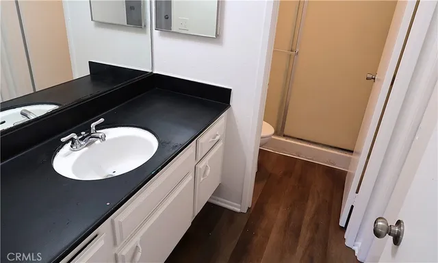 a view of a door and a window