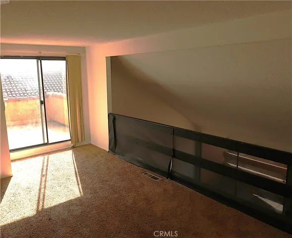 a view of yard with outdoor seating and green space