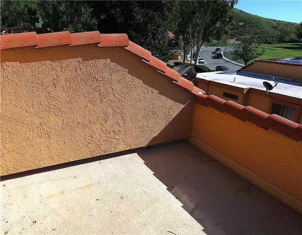 a view of a field with an trees