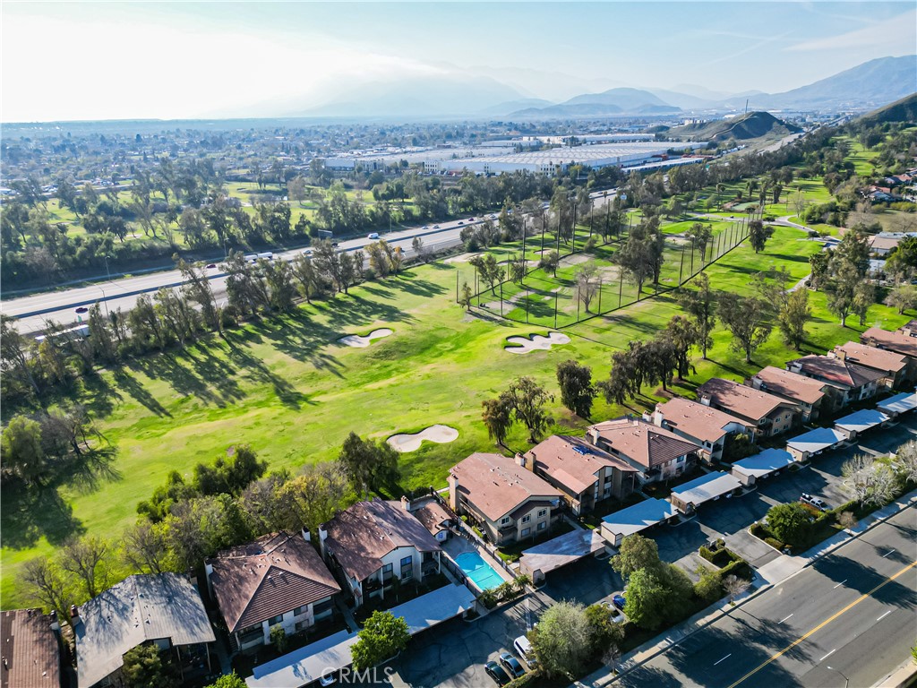 1440 West Edgehill Road, Unit 14 San Bernardino, CA 92405 - Photo 34 of 34 an aerial view of residential houses with outdoor space