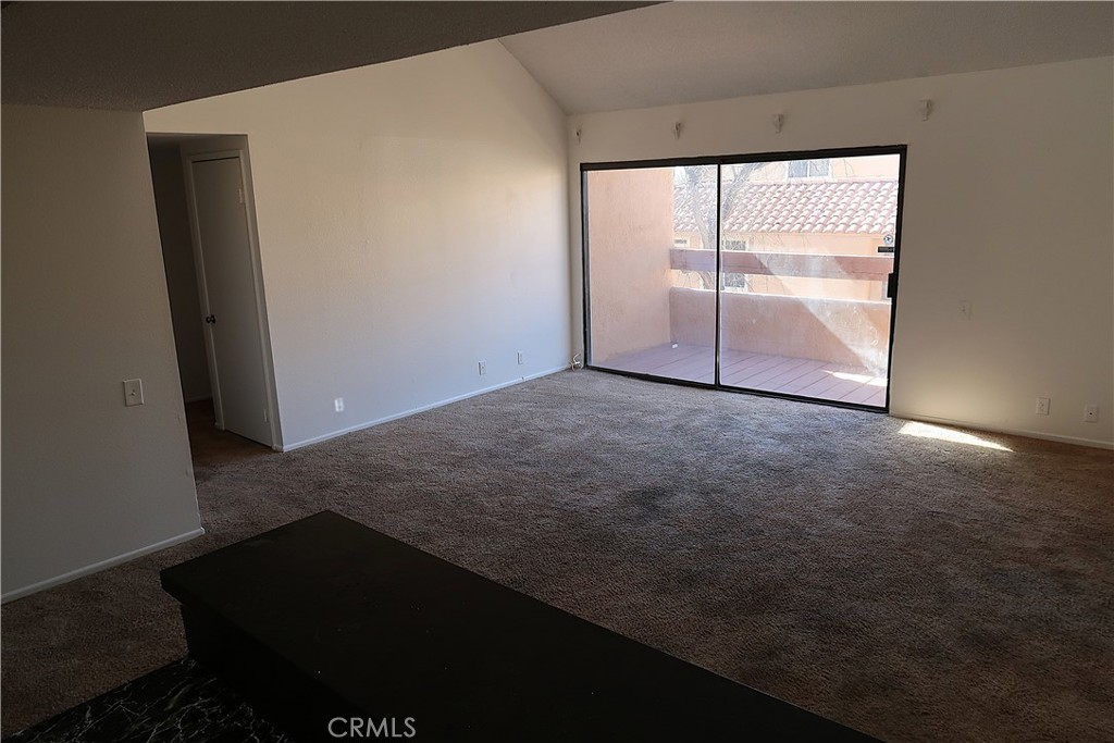 1440 West Edgehill Road, Unit 14 San Bernardino, CA 92405 - Photo 7 of 34 an empty room with windows