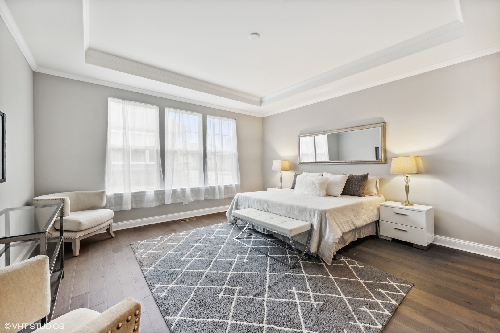 310 Arabian Circle Willowbrook, IL 60527 - Photo 16 of 36 a spacious bedroom with a bed and a couch