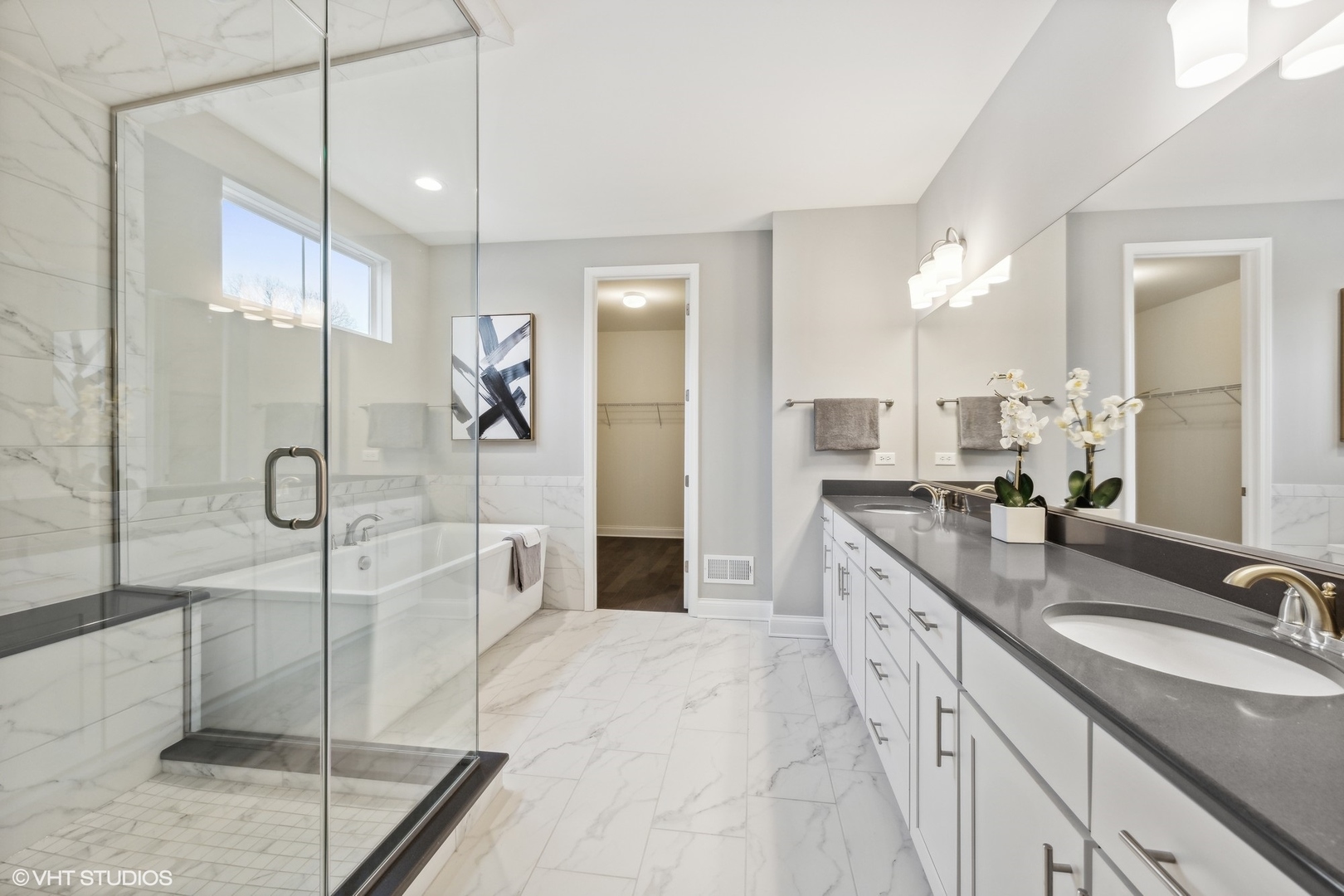310 Arabian Circle Willowbrook, IL 60527 - Photo 17 of 36 a large bathroom with a granite countertop sink mirror and shower