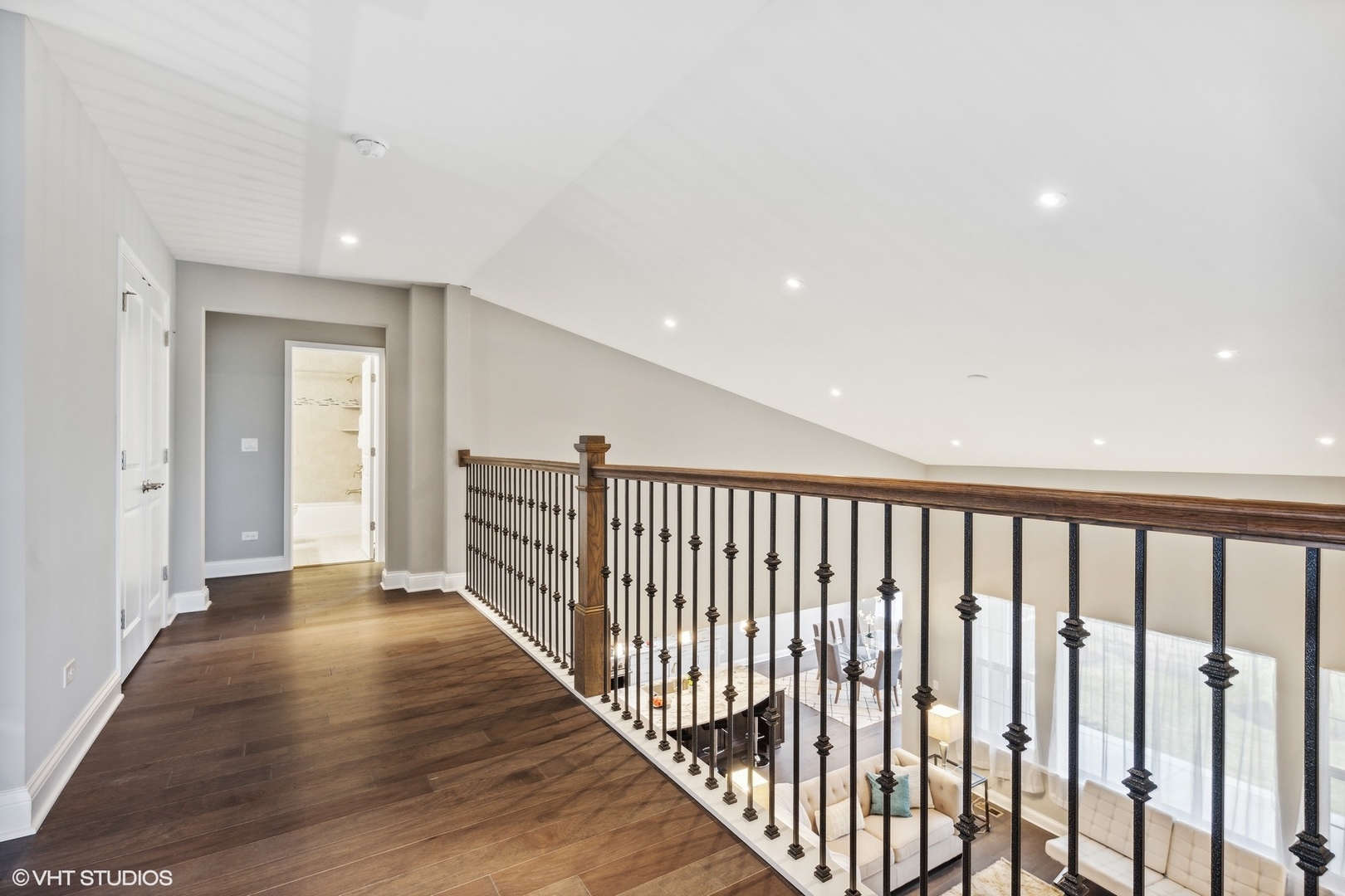 310 Arabian Circle Willowbrook, IL 60527 - Photo 22 of 36 a view of a hallway with wooden floor and staircase
