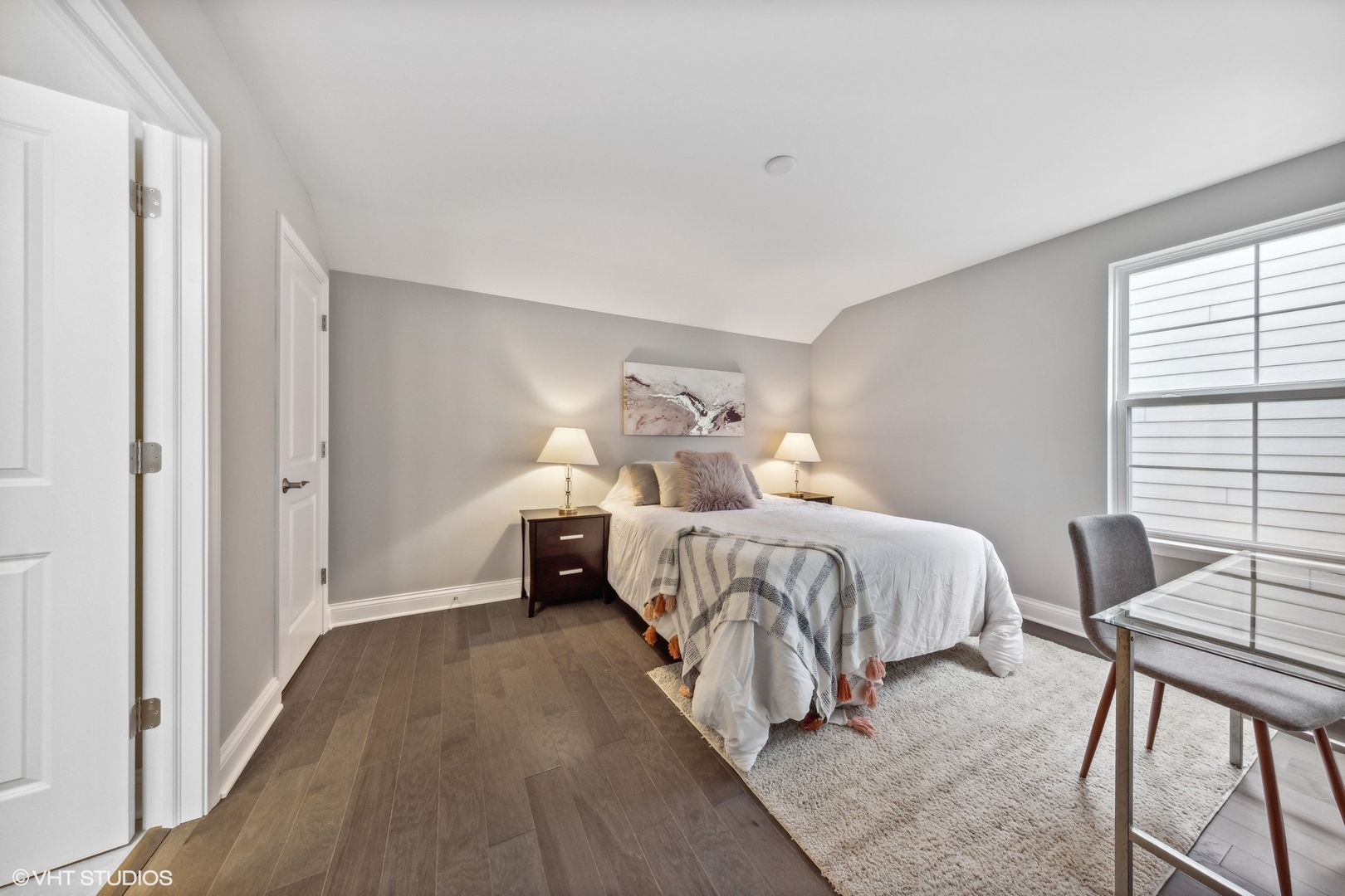 310 Arabian Circle Willowbrook, IL 60527 - Photo 23 of 36 a bedroom with a bed and wooden floor