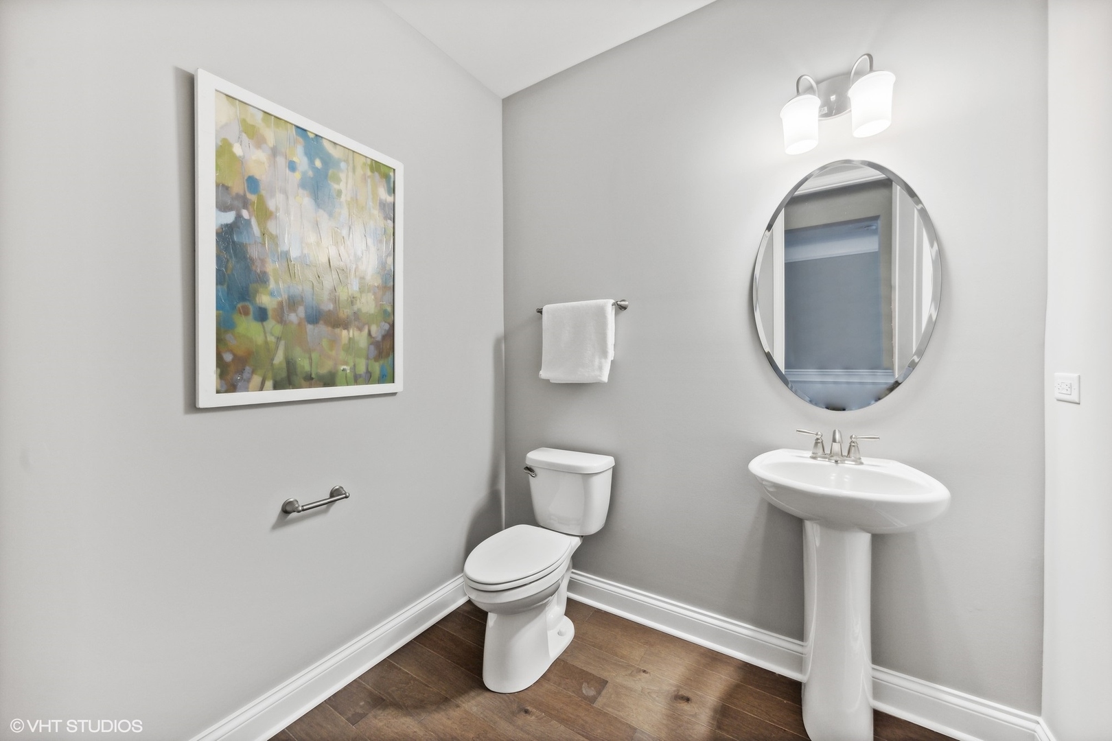 310 Arabian Circle Willowbrook, IL 60527 - Photo 28 of 36 a bathroom with a toilet sink and mirror