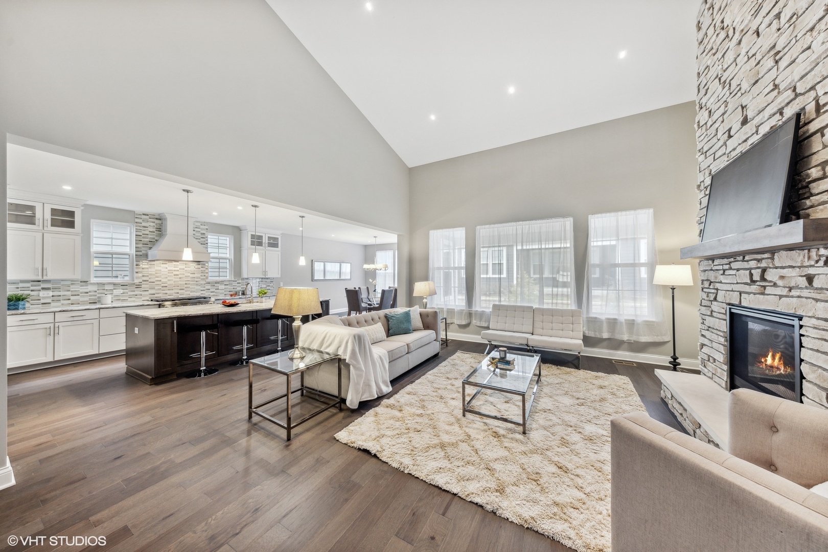 310 Arabian Circle Willowbrook, IL 60527 - Photo 7 of 36 a living room with furniture fireplace and a fireplace