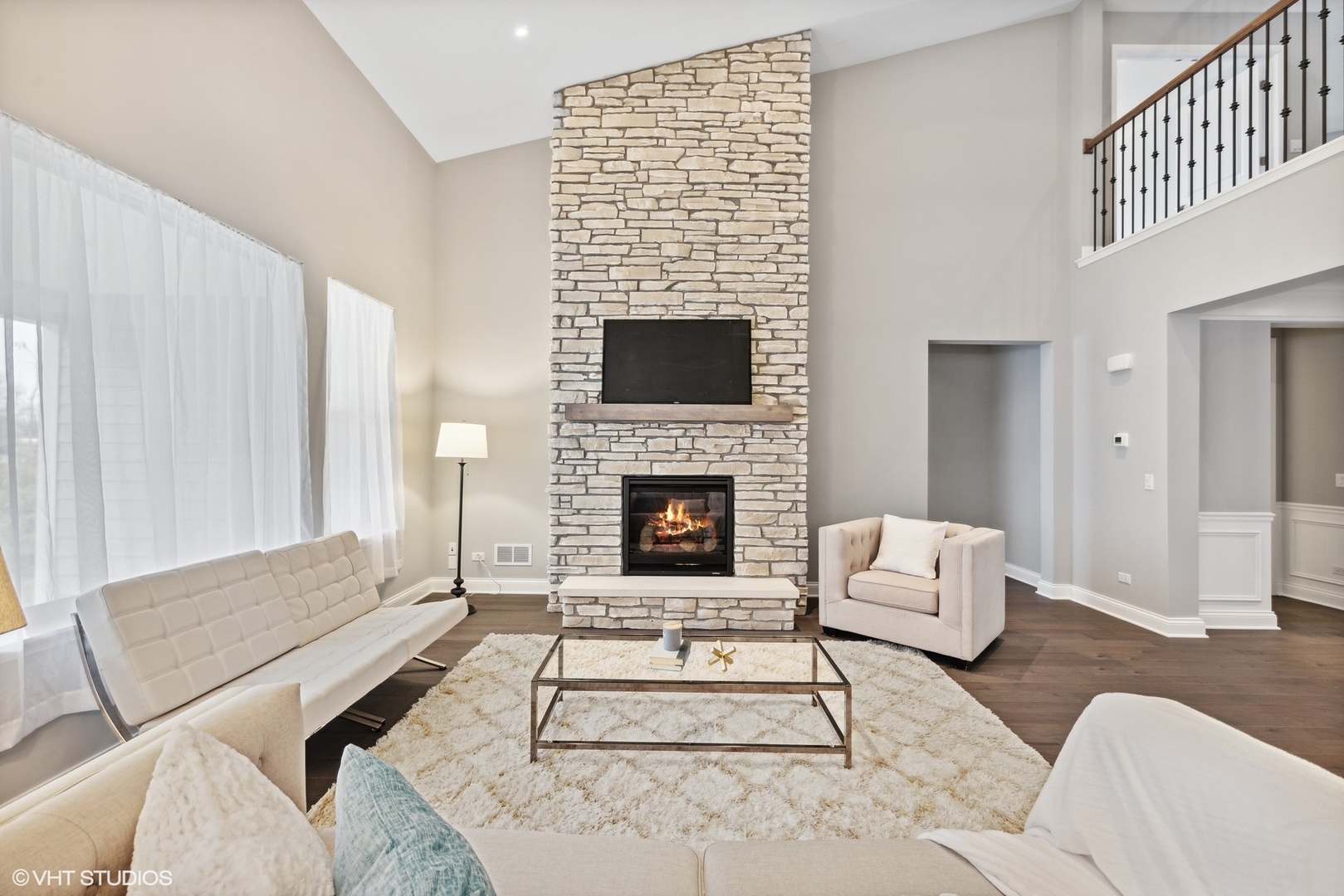 310 Arabian Circle Willowbrook, IL 60527 - Photo 10 of 36 a living room with furniture and a fireplace