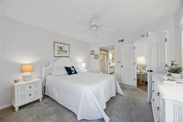 a bathroom with a double vanity sink and mirror