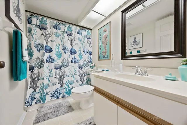 a view of a porch with furniture and a potted plant