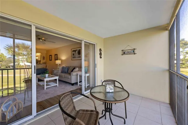 an aerial view of a house with a ocean view