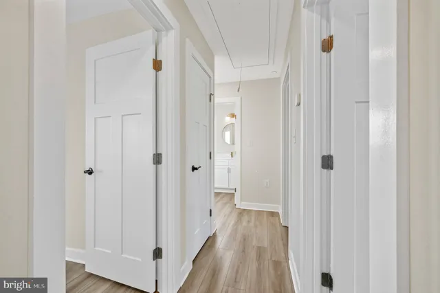 a view of a bathroom from the hallway