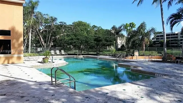 a view of a park with swings and slides
