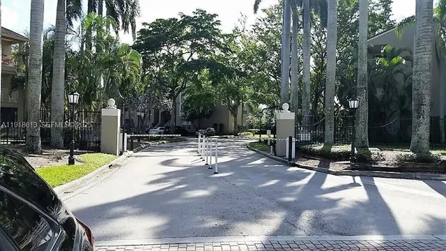 a view of a backyard with sitting area