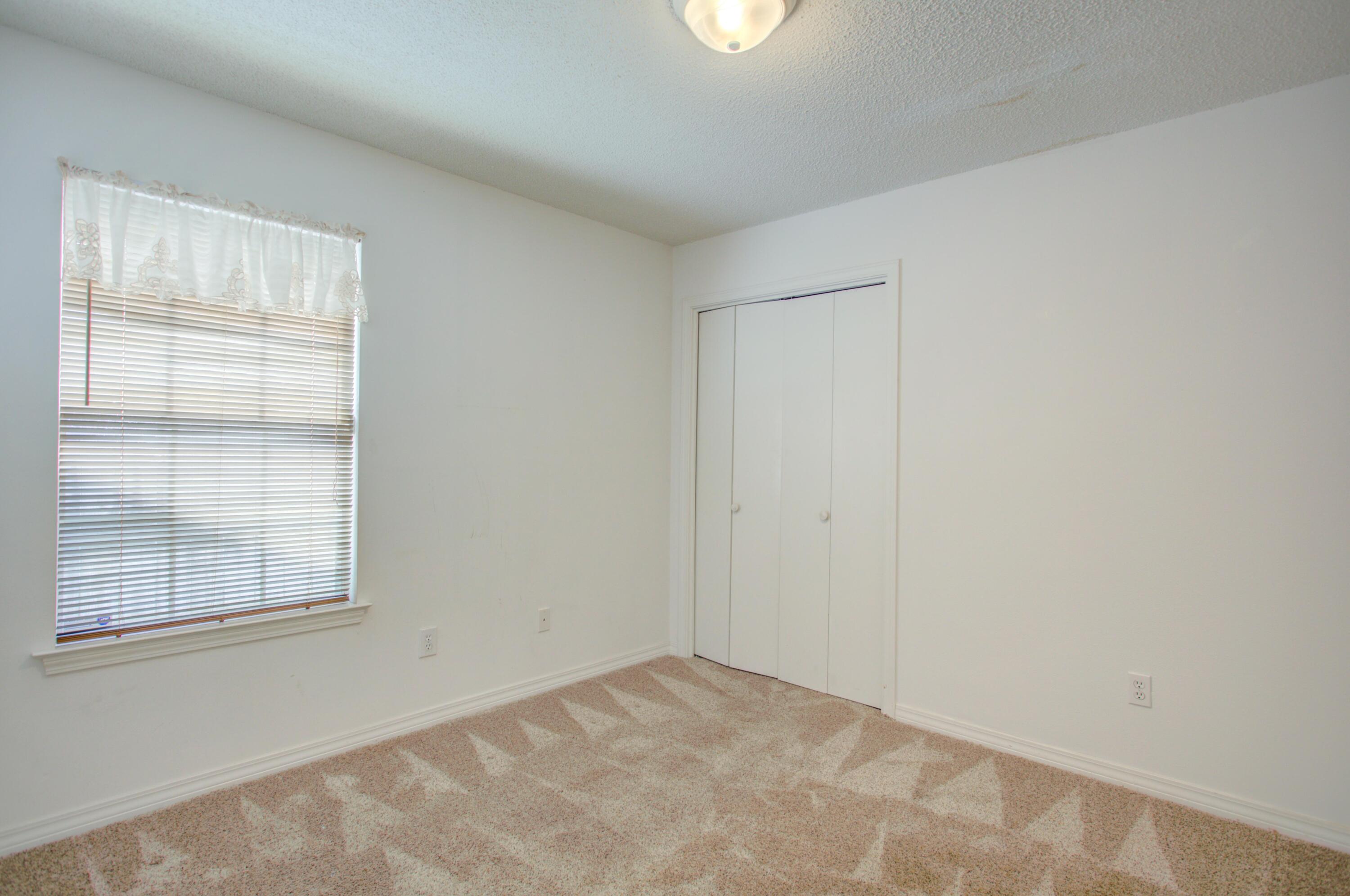 38 Ruby Circle Mary Esther, FL 32569 - Photo 13 of 16 an empty room with windows