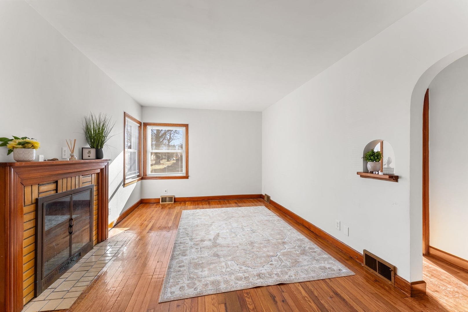 2341 33rd Street Moline, IL 61265 - Photo 3 of 12 a view of an empty room and wooden floor