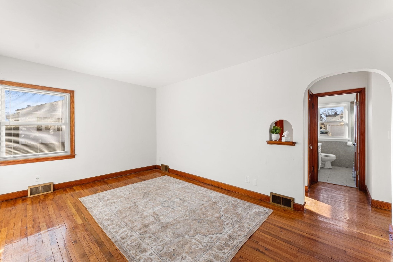 2341 33rd Street Moline, IL 61265 - Photo 5 of 12 a view of a room with wooden floor and cabinet