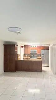 a view of kitchen with natural light