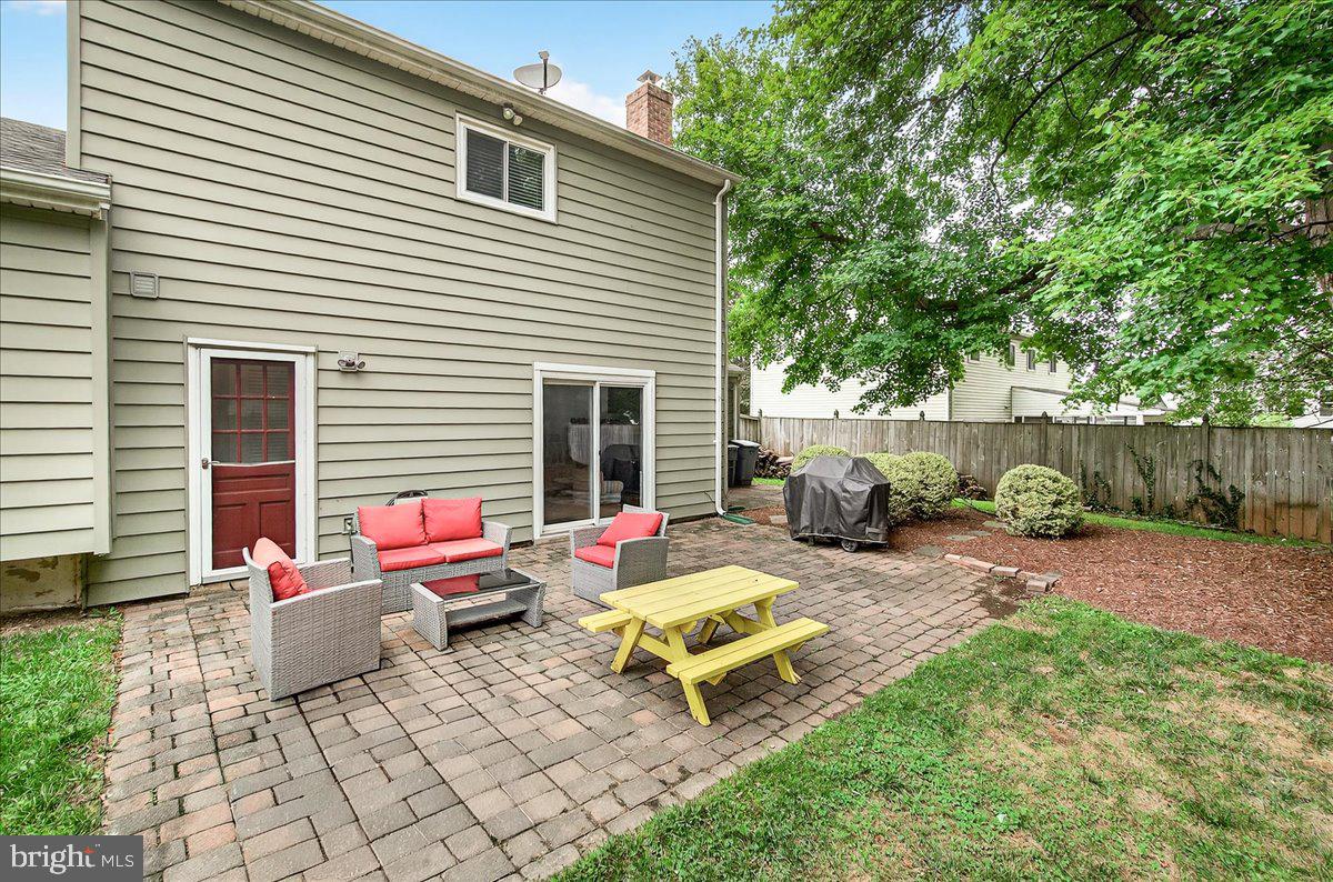 19808 Westerly Avenue Poolesville, MD 20837 - Photo 11 of 64 a house view with a backyard space