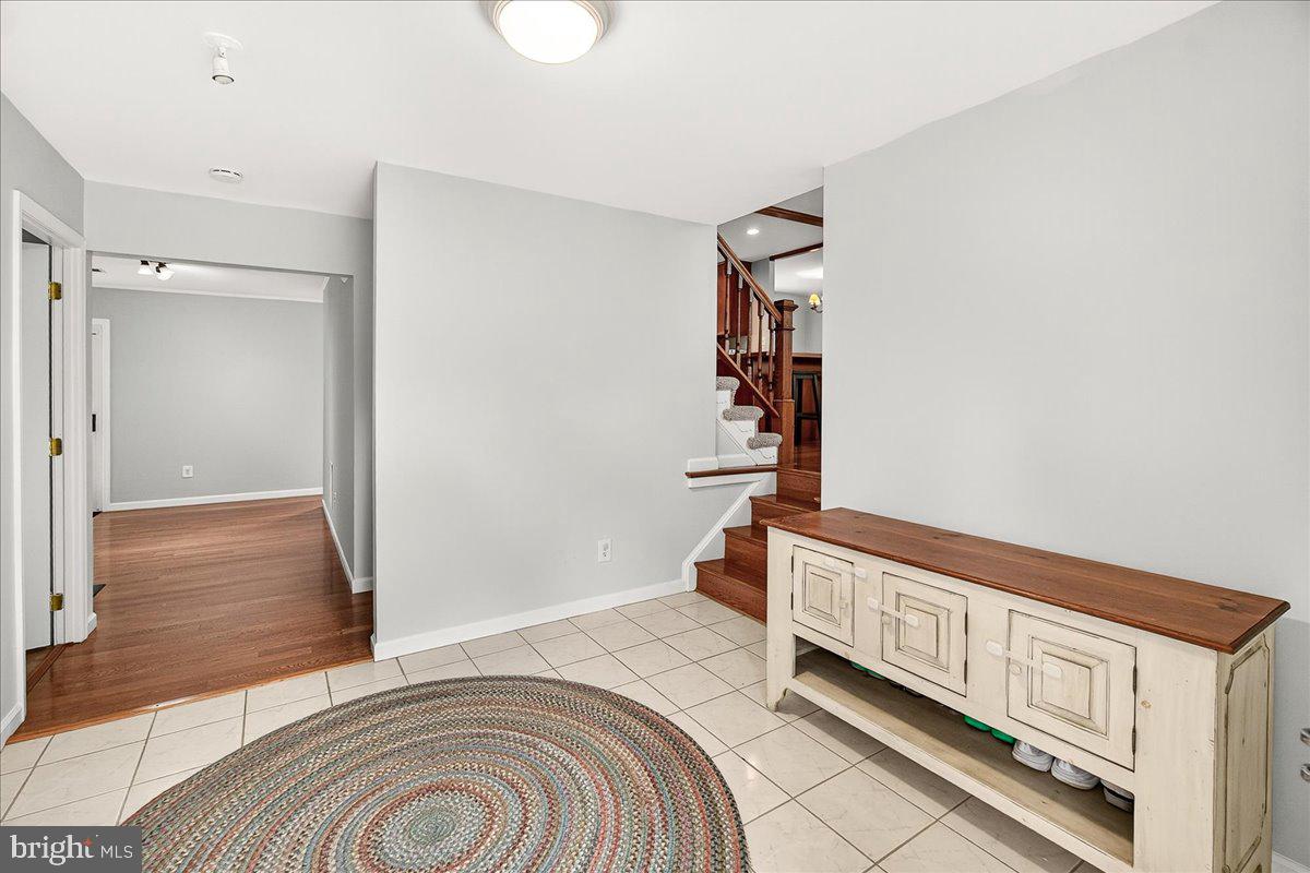 19808 Westerly Avenue Poolesville, MD 20837 - Photo 14 of 64 a view of a bedroom with wooden floor