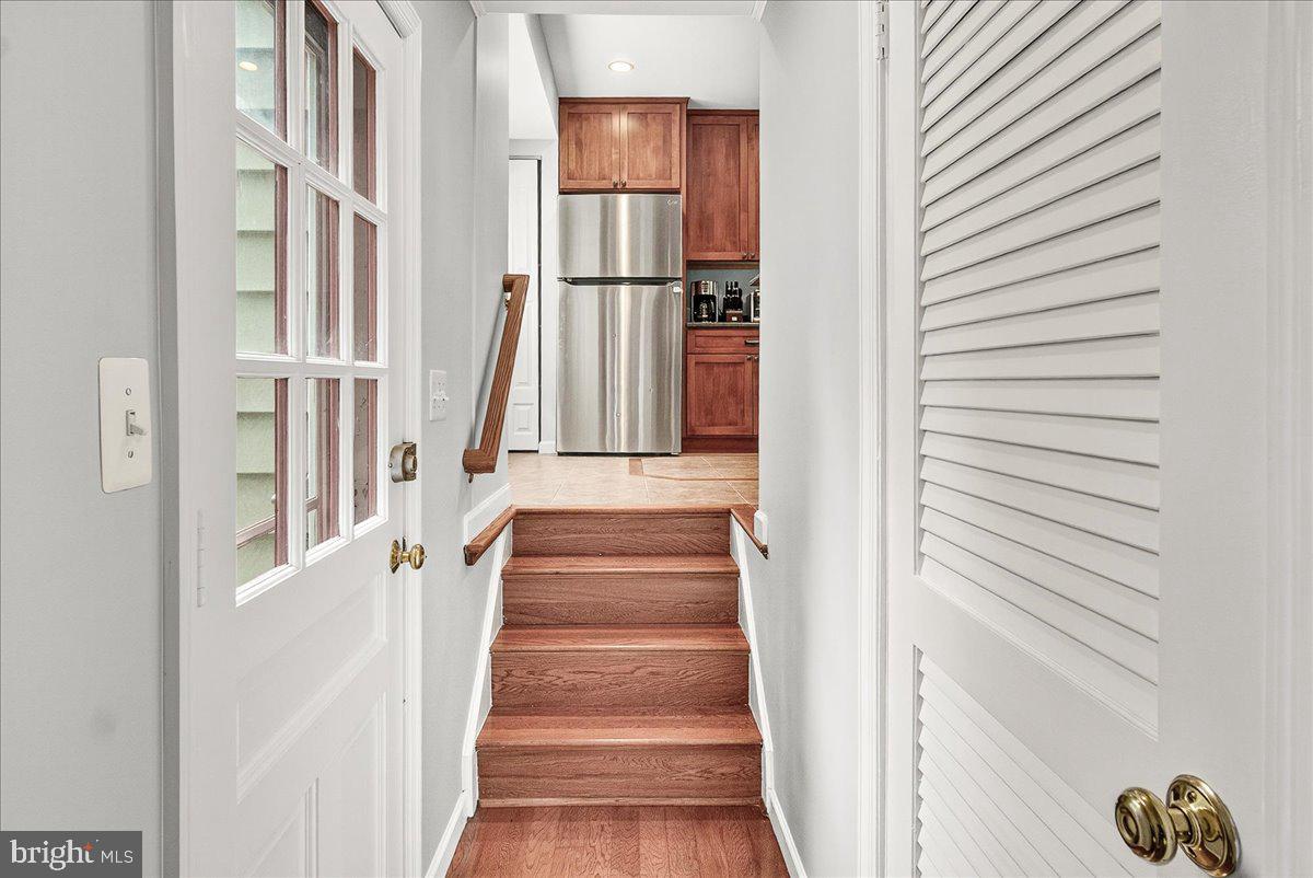 19808 Westerly Avenue Poolesville, MD 20837 - Photo 29 of 64 a view of staircase with white walls and a window
